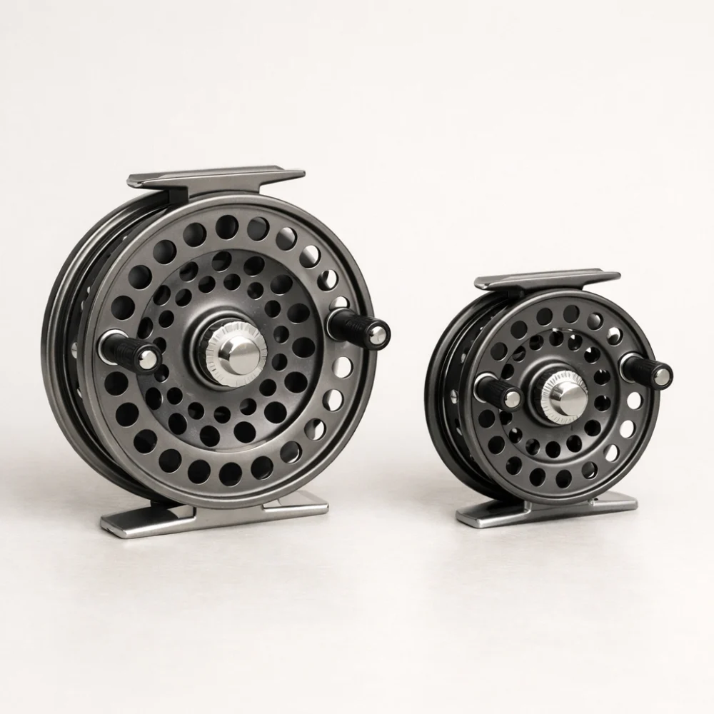 Two centre pin fishing reels shown side by side for size comparison