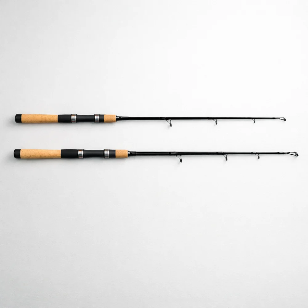 Two spinning rods of different lengths laid side by side