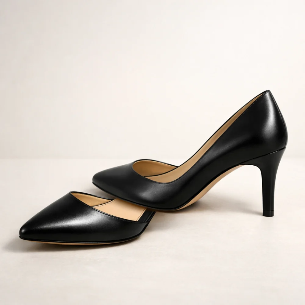 A pair of women’s formal shoes on a neutral background